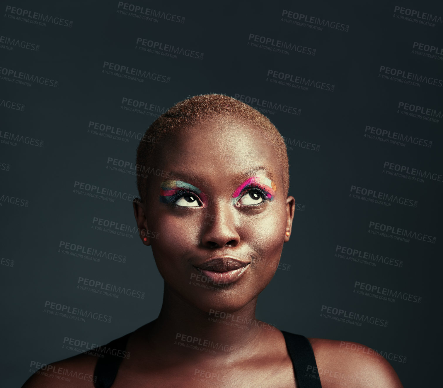 Buy stock photo Black woman, thinking and studio with colorful eyeshadow, for wellness plan with cosmetics. Paint, makeup and reflection on gray background for goal aesthetics or contemplation, beauty or facial glow