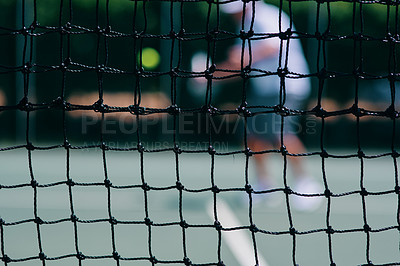 Buy stock photo Cropped shot of a tennis net on a court during the day