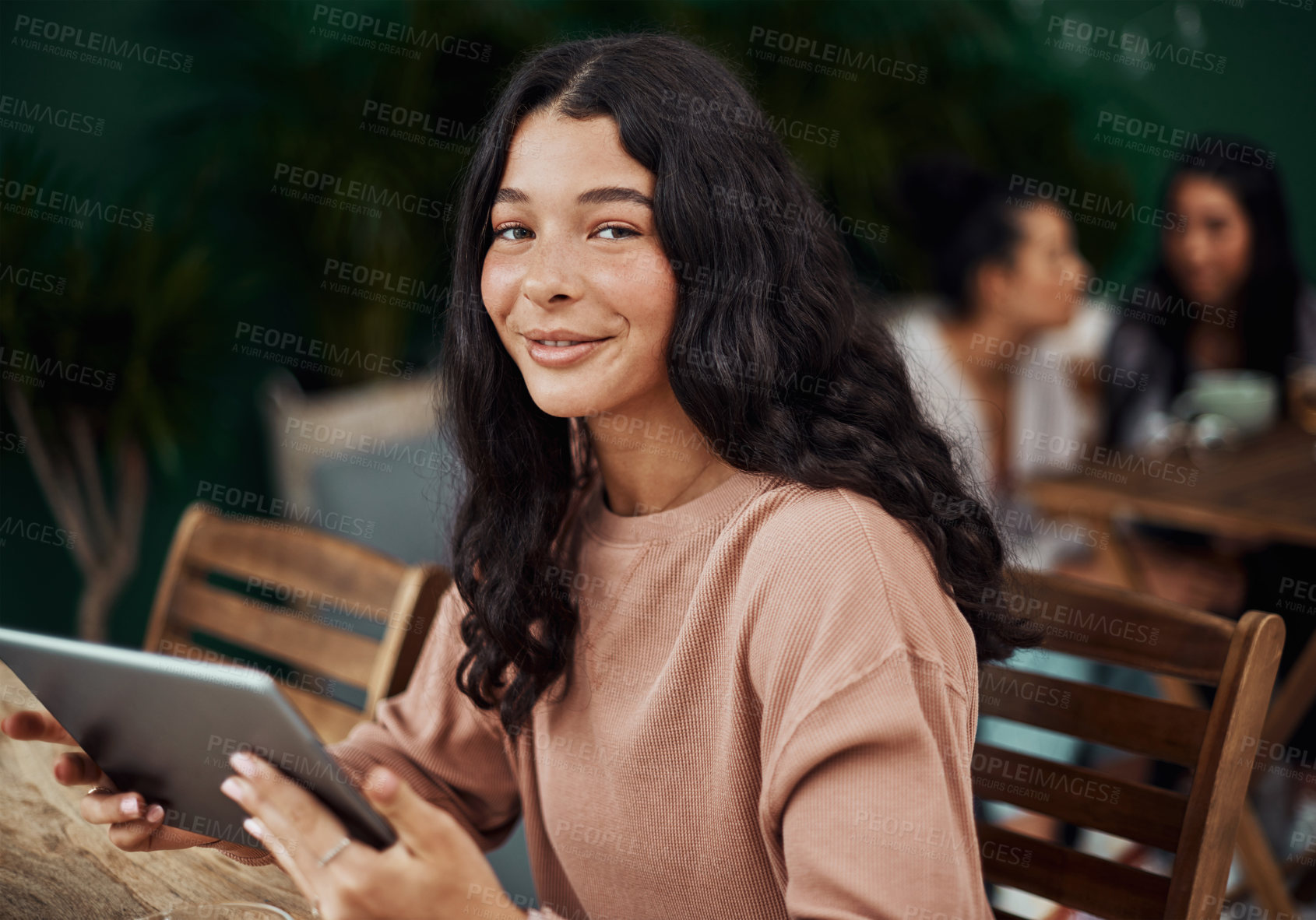 Buy stock photo Portrait, tablet and woman in coffee shop for social media, communication or studying at table. Digital, internet and teenage girl with tech for information, education or break from school in cafe