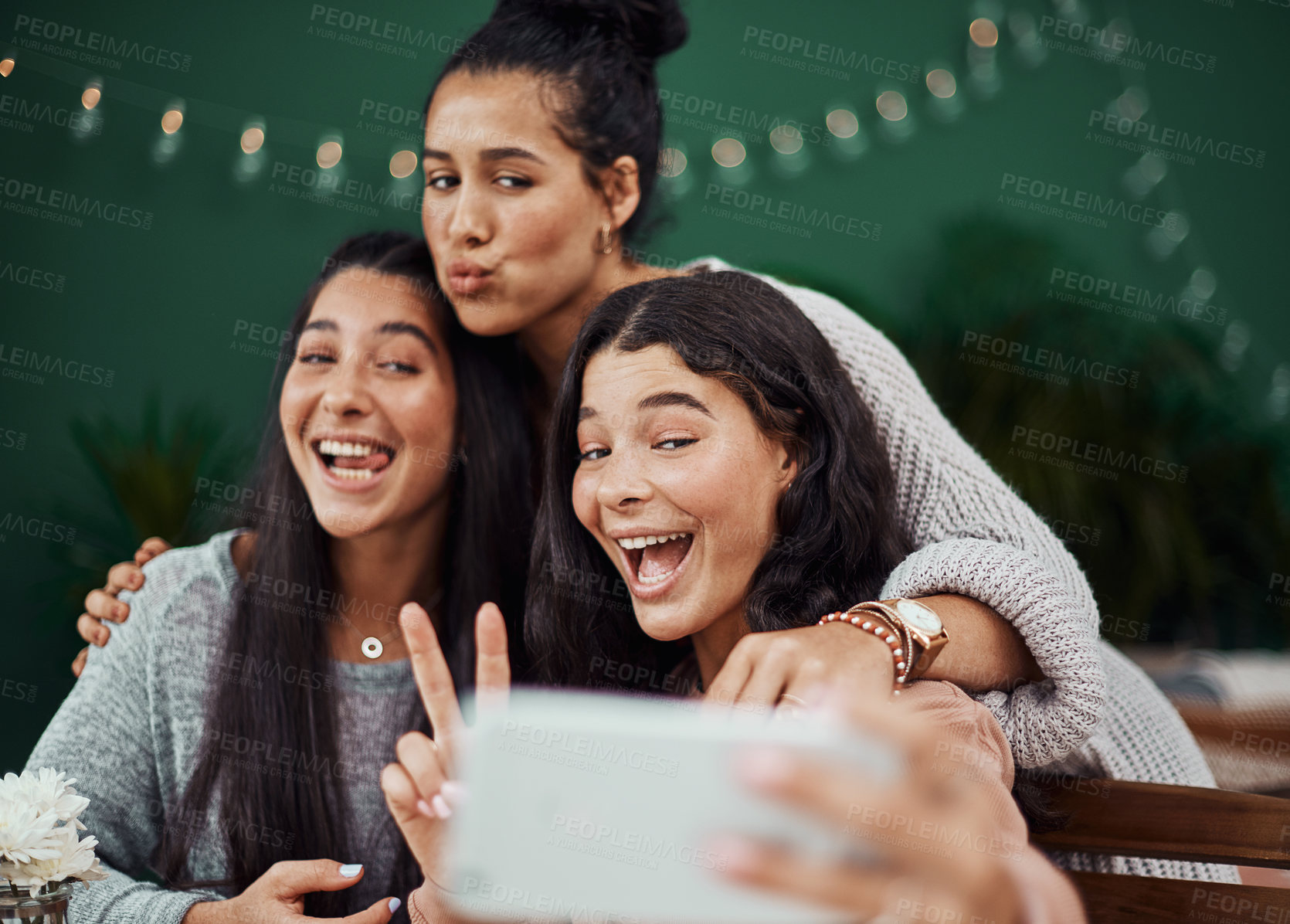 Buy stock photo Women, crazy and smile for selfie in cafe for love, good memories and social media update. Funny face, family bonding and sisters in coffee shop for photography, reunion or weekend catch up in Spain