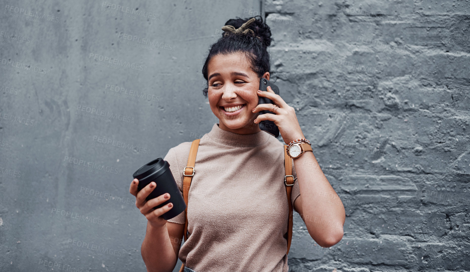 Buy stock photo Funny, conversation and woman with phone call in street for communication and joke in city. Student, gen z and coffee or networking by brick wall in New York for technology, comedy and connection 