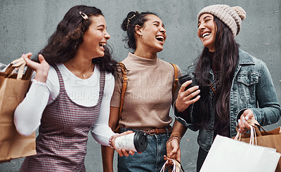 Buy stock photo Cropped shot of an attractive group of sisters bonding together during a shopping spree in the city