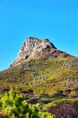 Buy stock photo Low angle of a mountain peak in South Africa. Scenic landscape of a remote hiking location on Lions Head in Cape Town on a sunny day with copy space. Stunning adventure and travel place to explore