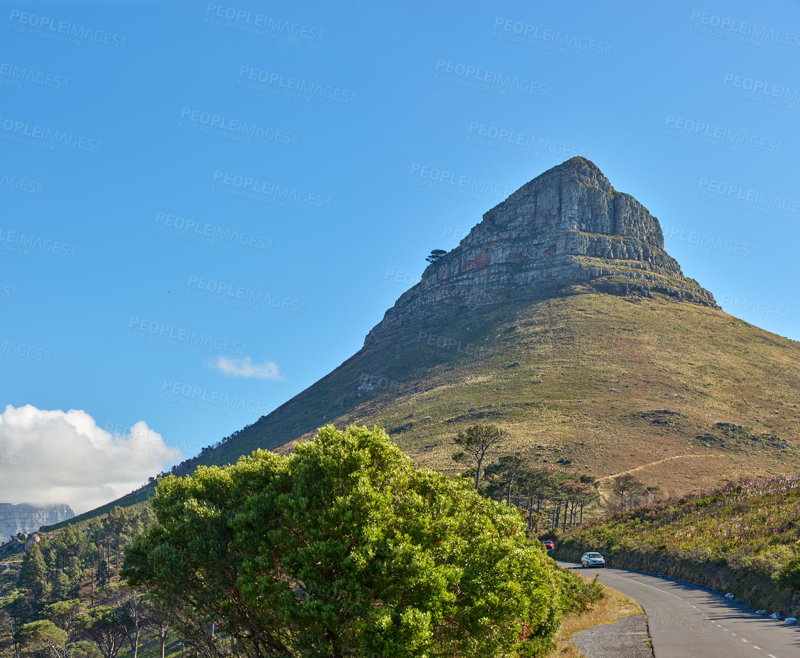 Buy stock photo Copy space with scenic landscape view of Lions Head mountain in Cape Town, South Africa against a blue sky background. Magnificent panoramic of an iconic landmark to travel, explore and pass by road
