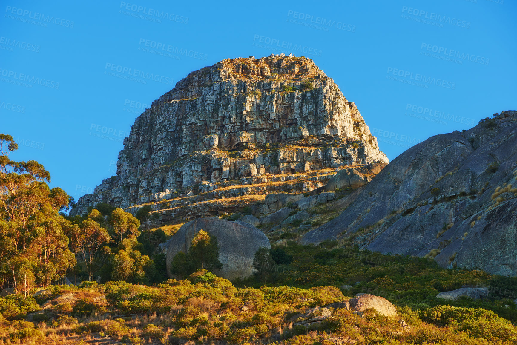 Buy stock photo Low angle of a mountain peak in South Africa. Scenic landscape of a remote hiking location on Lions Head in Cape Town on a sunny day with copy space. Stunning adventure and travel place to explore