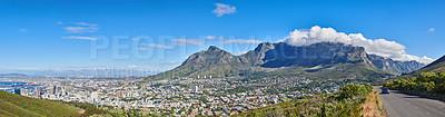 Buy stock photo City landscape near mountains with a cloudy blue sky background on a sunny summer day. Beautiful cityscape of Cape Town, South Africa as a travel vacation or holiday destination in a coastal location