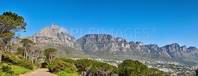 Buy stock photo A scenic landscape view of Table Mountain in Cape Town with copy space. South Africa against a blue sky background. Magnificent panoramic of an iconic natural landmark and famous travel destination