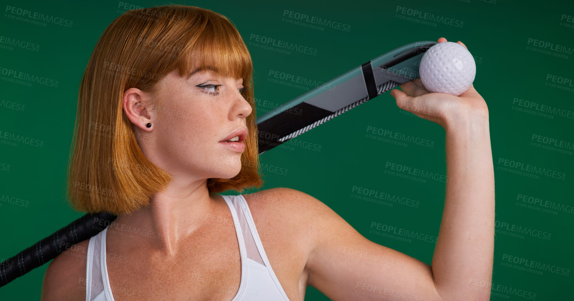 Buy stock photo Fitness, woman and hockey for sports in studio with equipment for performance, workout goals and competition. Thinking, female athlete and planning with stick, ball and games on green background