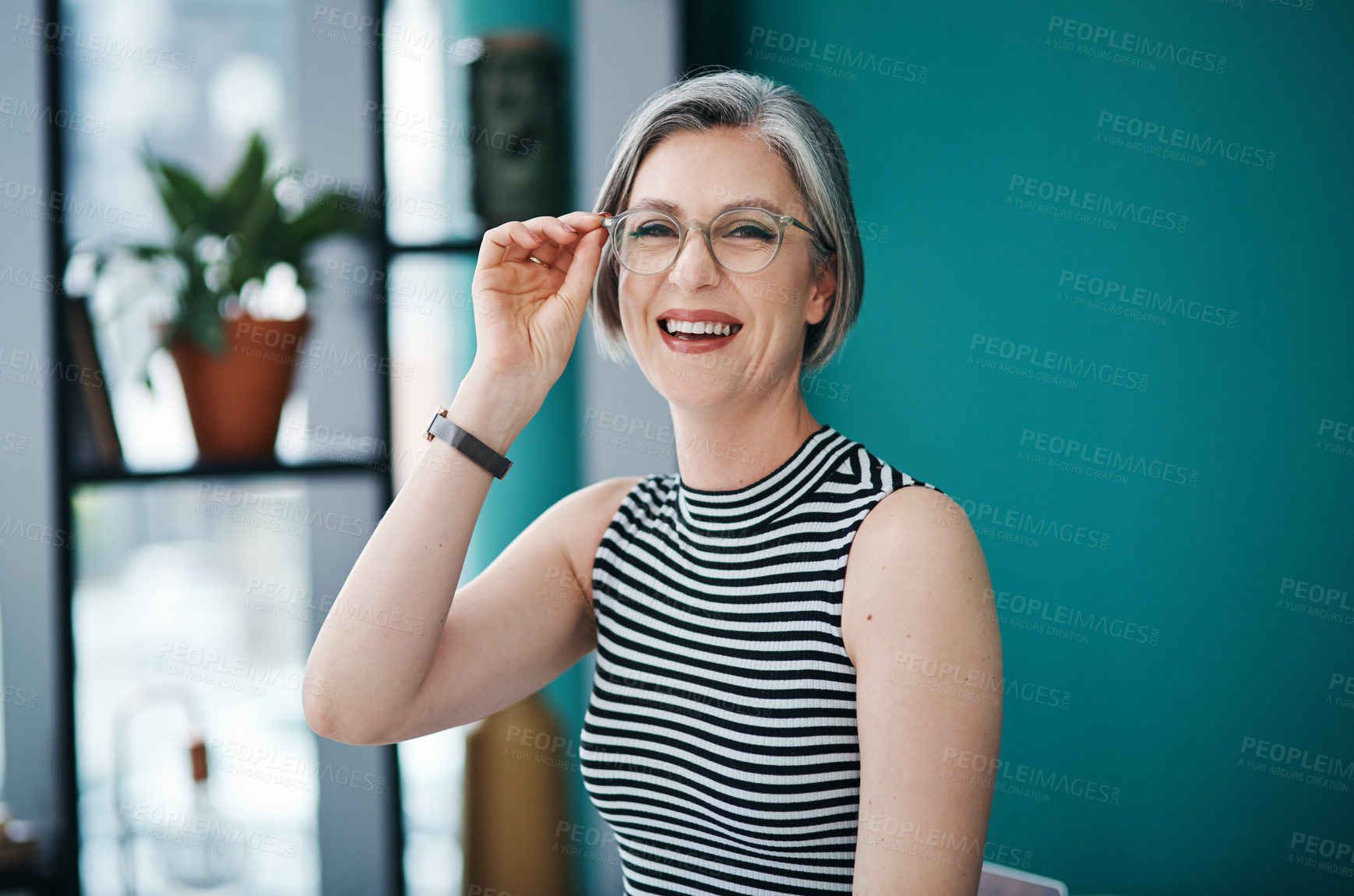 Buy stock photo Cropped shot of a mature businesswoman in her office