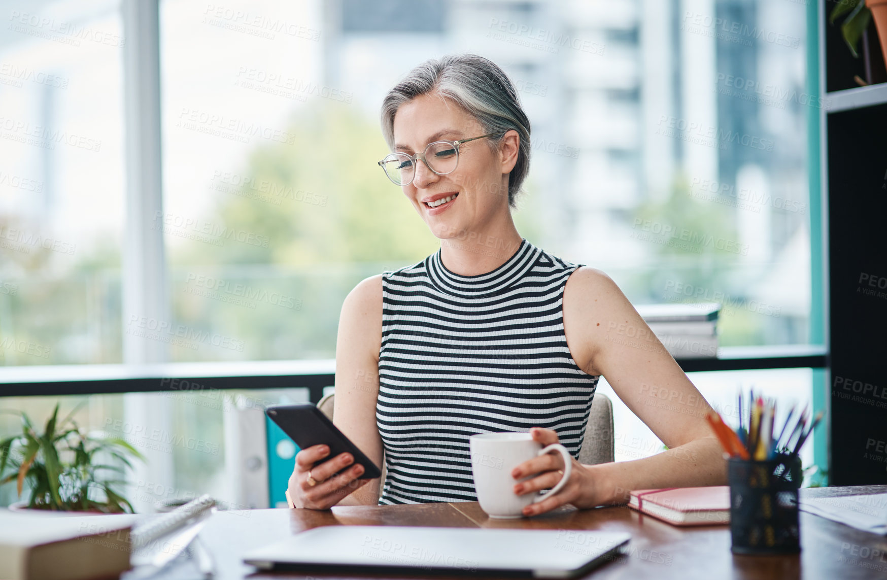 Buy stock photo Mature woman, business and phone for communication, networking and client management in office. Consultant, corporate and mobile for consulting, email and company development with investment growth