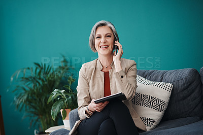 Buy stock photo Cropped portrait of an attractive mature businesswoman sitting alone and using technology in her home office