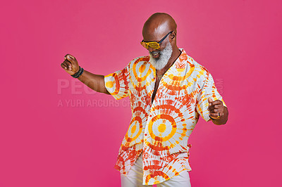 Buy stock photo Cropped shot of a funky and stylish senior man dancing in studio against a pink background