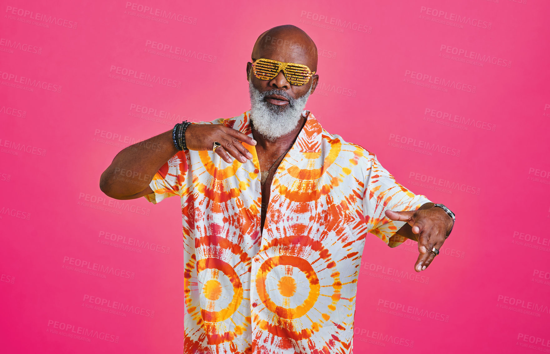 Buy stock photo Black man, dancing and portrait in studio with energy, freedom and summer fashion. Mature person, winner and funky shades on pink background with positive attitude, party and birthday celebration