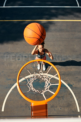 Buy stock photo Above, basketball court and woman with net, sports and practice for game, cardio and hobby. Outdoor, person and player with recreation, exercise and workout with wellness, energy and training