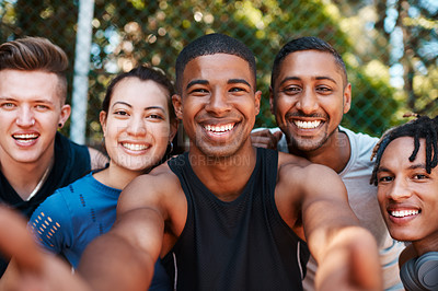 Buy stock photo Portrait of a group of sporty young people taking selfies together outdoors