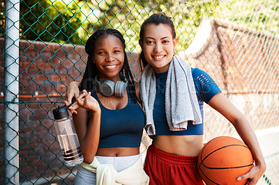 Buy stock photo Women, outdoor and towel in portrait for fitness or training on basketball court as athlete. Female people, team and together on fence for competition, exercise or game with happiness, pride or break