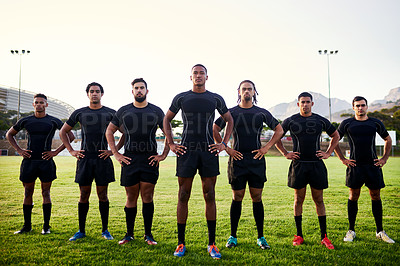 Buy stock photo Full length portrait of a diverse group of sportsmen standing together before playing rugby during the day