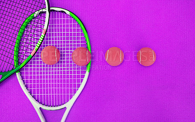 Buy stock photo High angle shot of tennis essentials placed on top of a purple background inside of a studio