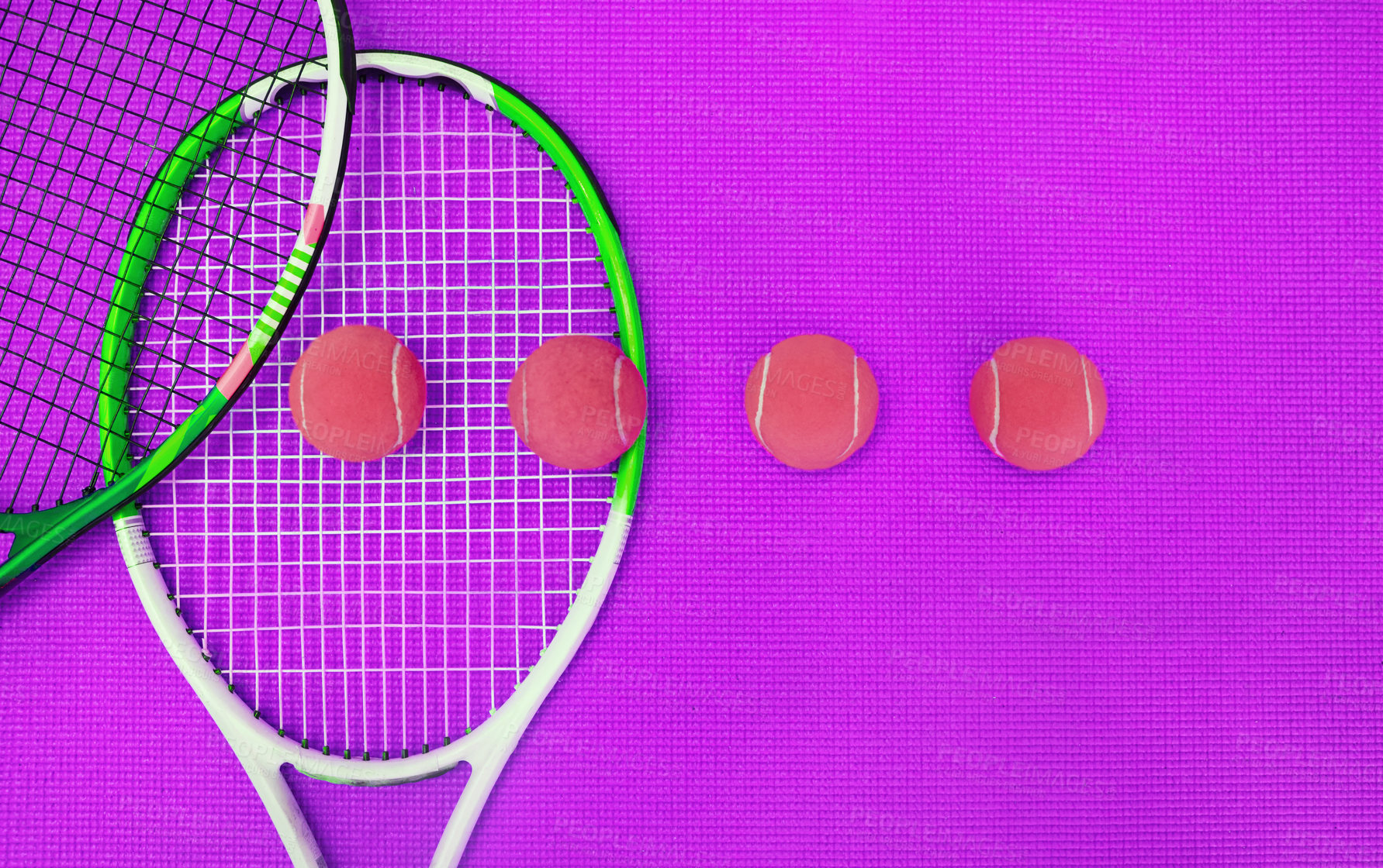 Buy stock photo High angle shot of tennis essentials placed on top of a purple background inside of a studio