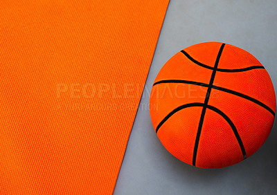 Buy stock photo Equipment, studio and basketball for sport or game, fitness and training for competition or match. Ball, orange and gray background for athletic activity or tournament, practice and skill development