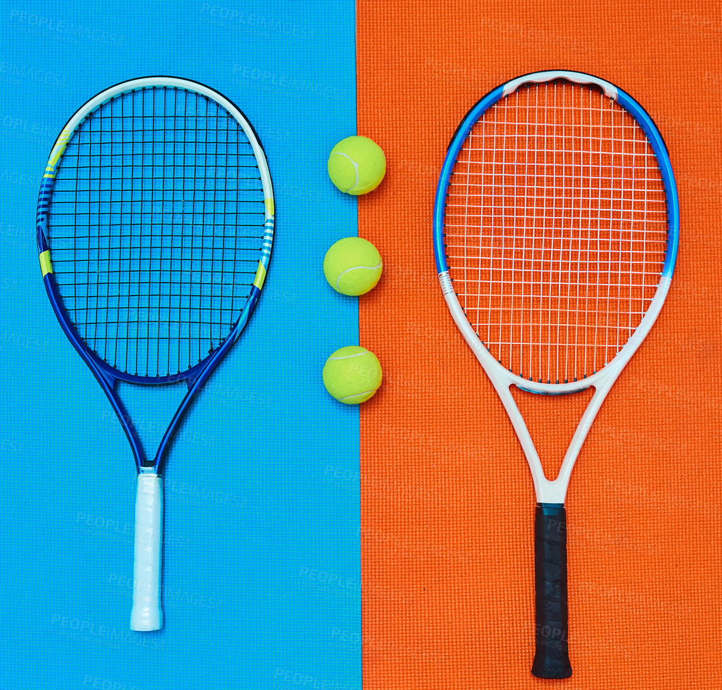 Buy stock photo High angle shot of tennis essentials placed on top of a colourful background inside of a studio