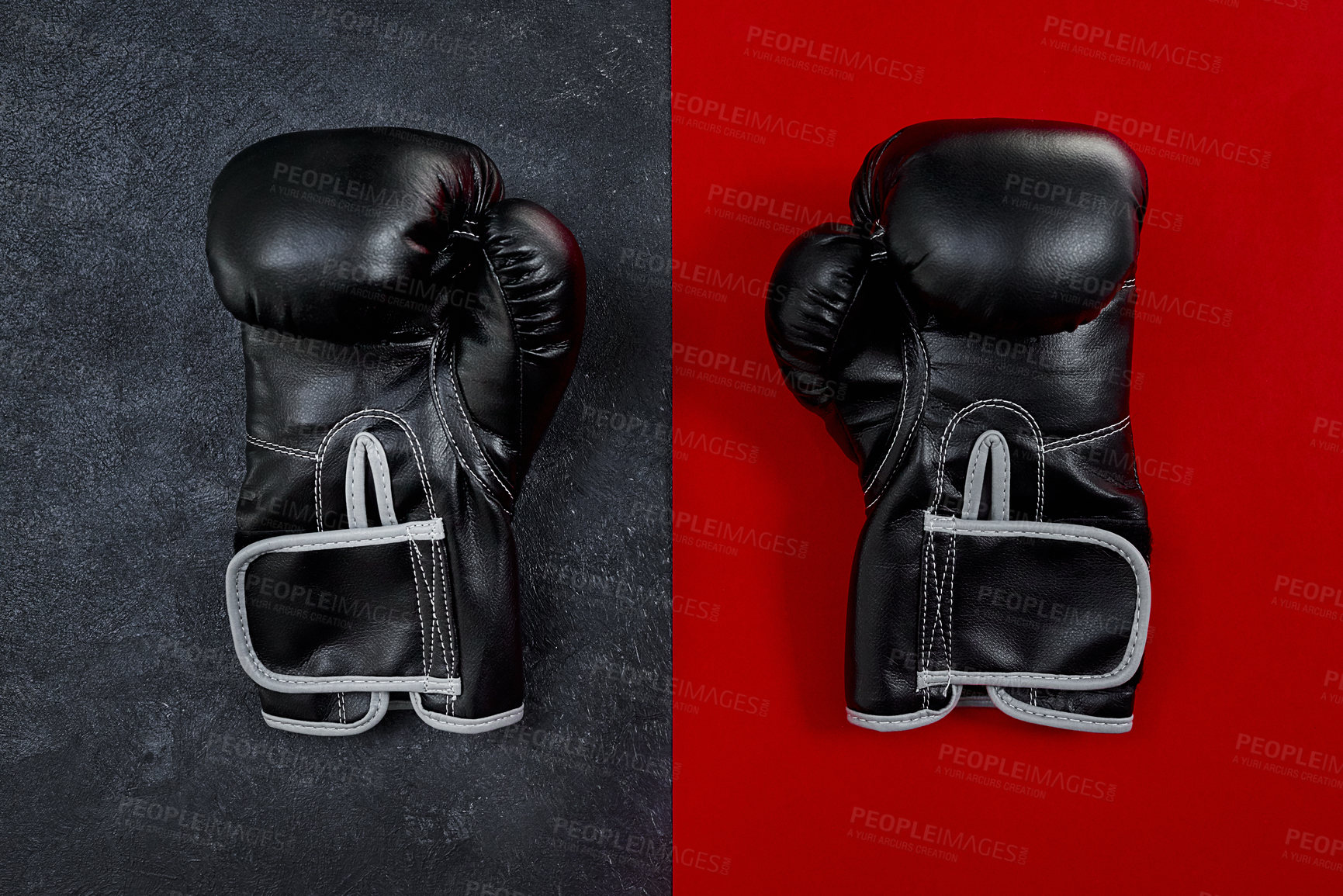 Buy stock photo High angle shot of a pair of boxing gloves placed together on top of a multi coloured background inside of a studio