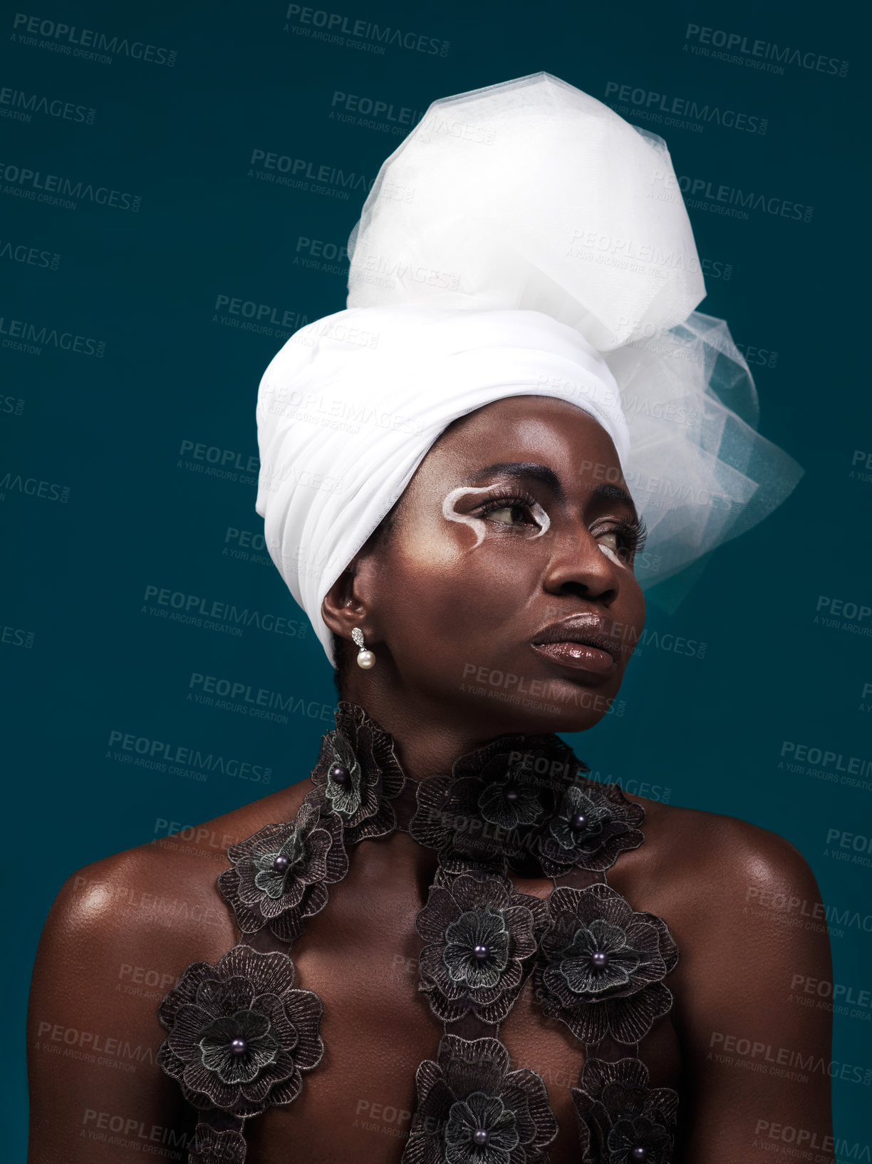 Buy stock photo Beauty, fashion and black woman in makeup with headwrap
in studio isolated on a blue background. African model, cosmetics and head scarf with serious face for traditional style, elegance or thinking
