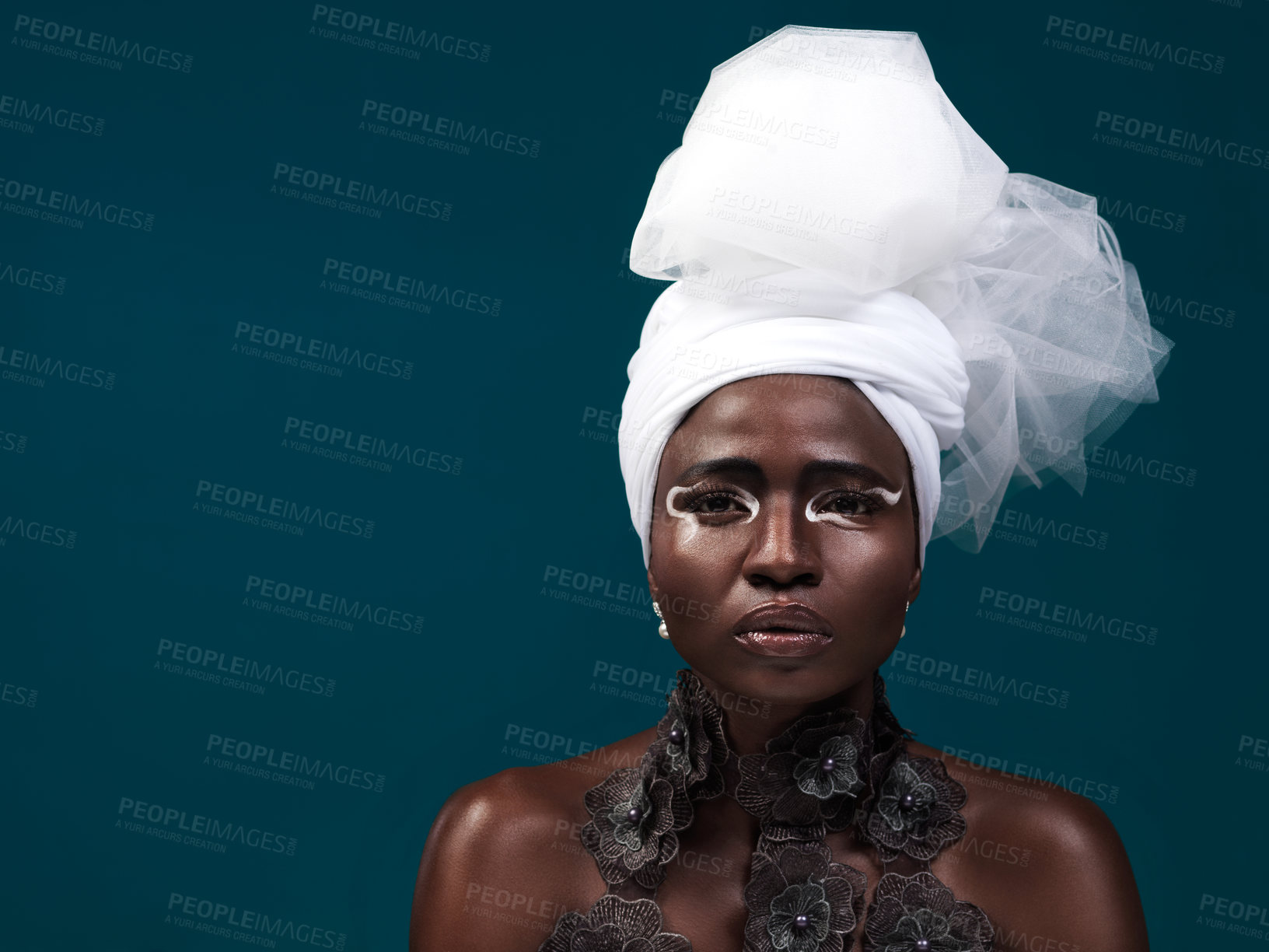 Buy stock photo Beauty, fashion and portrait of black woman in turban and makeup in studio isolated on blue background mockup. African model, cosmetics and head scarf with serious face for traditional style in Kenya