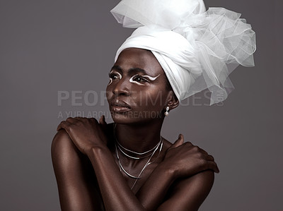 Buy stock photo Thinking, wrap or black woman with makeup, fashion or beauty in studio on grey background. Skincare, turban or African model with traditional outfit, eyeshadow cosmetics or necklace for culture pride