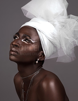 Buy stock photo Profile, model and black woman with makeup, wrap and confidence in studio on grey background. Beauty, skincare and African lady with traditional fashion, eyeshadow cosmetics and creative with glamour