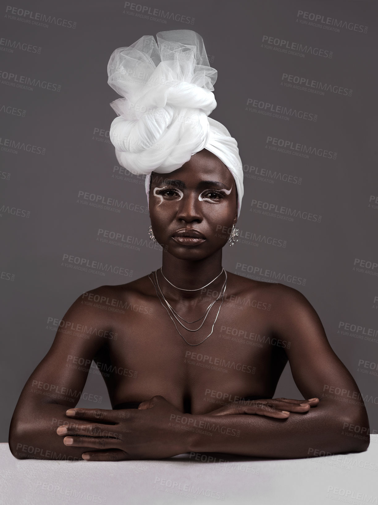 Buy stock photo Portrait, wrap and black woman with makeup, skincare or confidence in studio on grey background. Beauty, glow or proud African model with traditional outfit, eyeshadow cosmetics or creative necklace 
