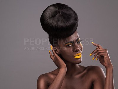 Buy stock photo African, model and studio portrait with makeup, beauty and creative yellow lipstick. Bold, woman and skin with confidence, dramatic hair and bun for glamour and trendy cosmetics on grey background