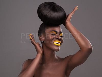 Buy stock photo Studio shot of a beautiful young woman posing against a grey background