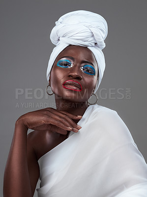 Buy stock photo African, queen and woman with creative makeup, art and pride in beauty of indigenous culture. Studio, portrait and model with color face paint, cosmetics and traditional tribal aesthetic in fashion