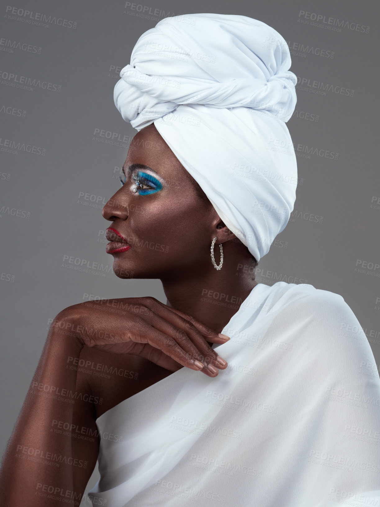 Buy stock photo African, queen and woman with creative makeup, profile and pride in beauty of indigenous culture. Studio, portrait and model with glow on skin with color cosmetics or traditional tribal aesthetic