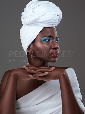 Buy stock photo African, woman and creative makeup idea for art and pride in beauty of indigenous culture. Studio, model and thinking with color paint on skin with glow from cosmetics, skincare and traditional style