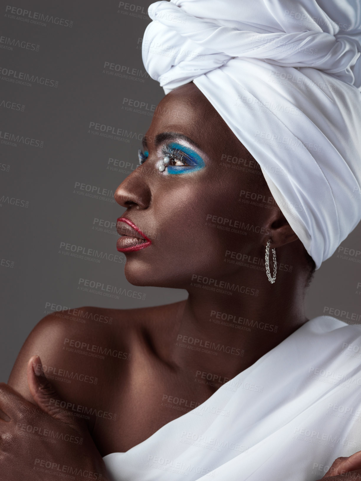 Buy stock photo African, makeup and creative woman with idea for art or pride in beauty of indigenous culture. Studio, model and thinking with color on skin and glow from cosmetics, paint and traditional profile
