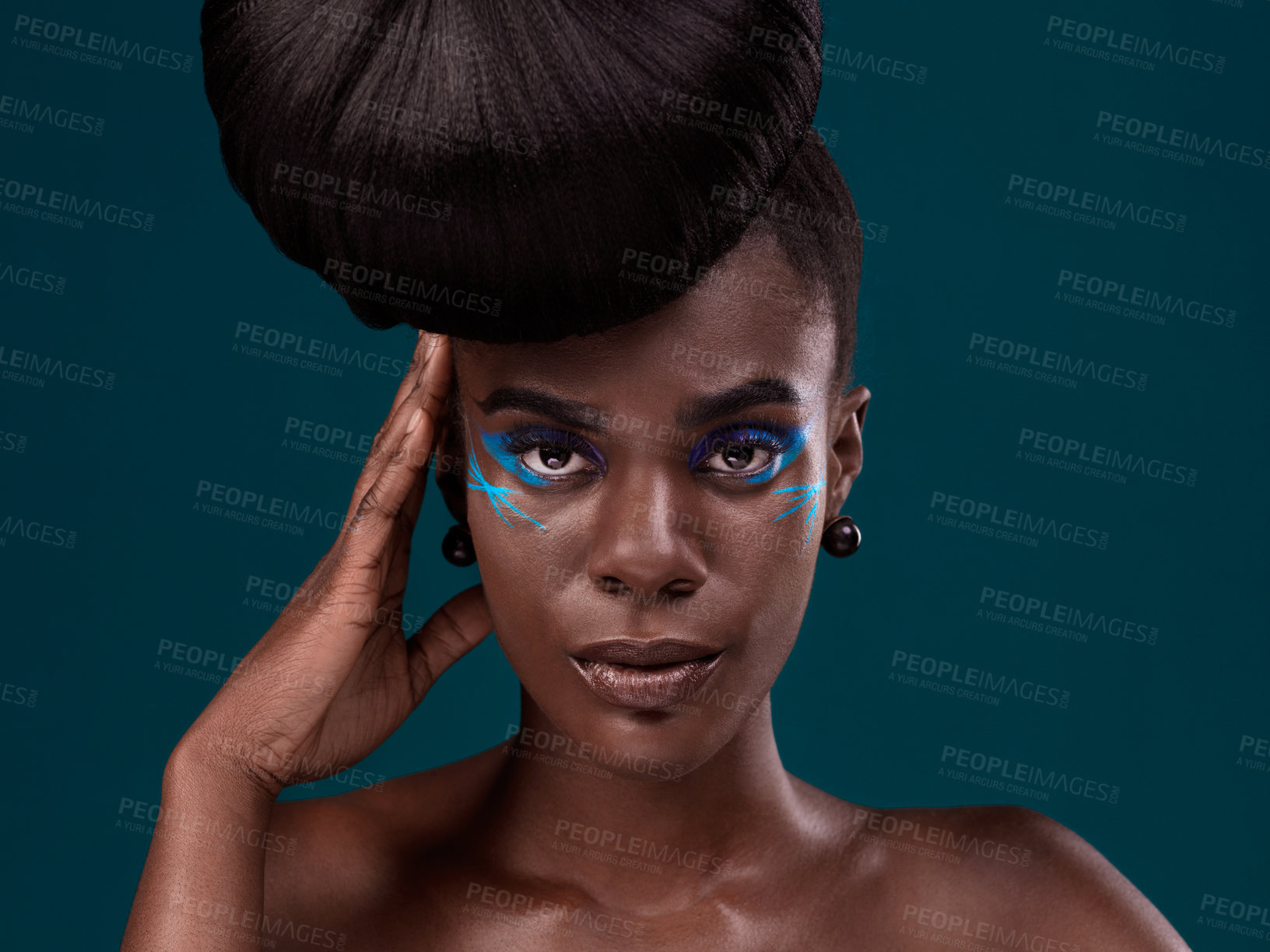 Buy stock photo Portrait, hair and makeup with a model black woman in studio on a blue background for beauty. Face, haircare and cosmetics with an attractive young female person at the salon for fashion or styling