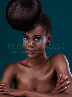 Buy stock photo Portrait or head and shoulders makeup with a black woman in studio on a blue background for hair or cosmetics. Face, haircare and fashion with an attractive young female model at the salon for style