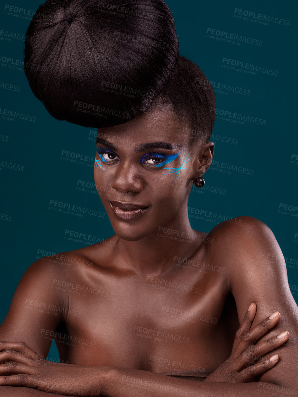 Buy stock photo Portrait or head and shoulders makeup with a black woman in studio on a blue background for hair or cosmetics. Face, haircare and fashion with an attractive young female model at the salon for style