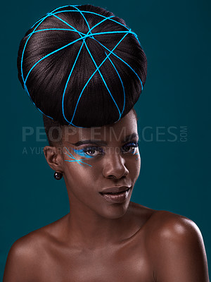 Buy stock photo Portrait, hair and fashion with a model black woman in studio on a blue background for beauty. Face, haircare and cosmetics with an attractive young female person at the salon for makeup or styling
