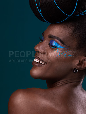 Buy stock photo Happy, hair and makeup with a model black woman in studio on a blue background for beauty. Smile, haircare and cosmetics with an attractive young female person at the salon for fashion or styling