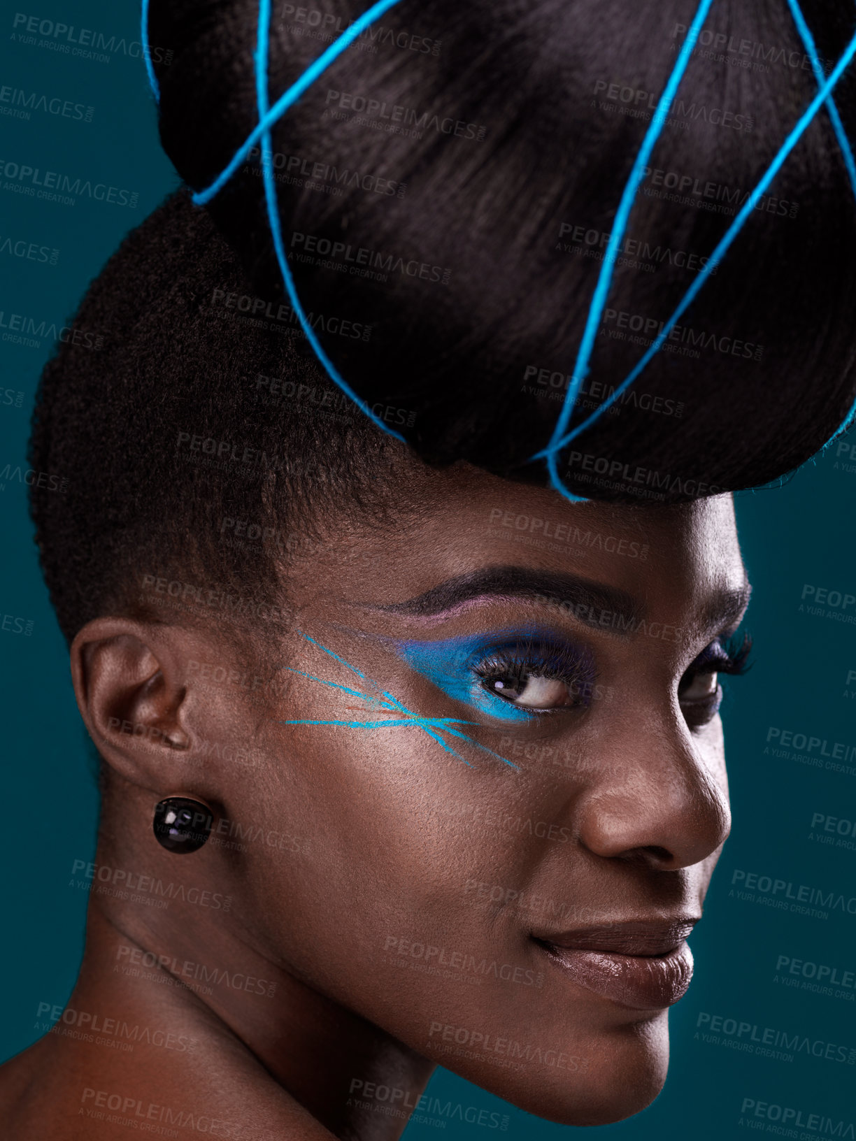 Buy stock photo Portrait, hair and makeup with a black woman closeup in studio on a blue background for beauty. Face, haircare and cosmetics with an attractive young female model at the salon for fashion or styling