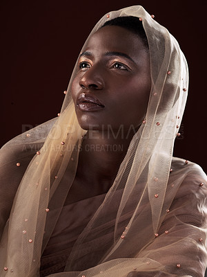 Buy stock photo African, beauty or woman thinking of makeup, scarf or confidence glow in studio on black background. Shine, face or proud model with traditional wrap, eyeshadow cosmetics or creative fashion in Ghana