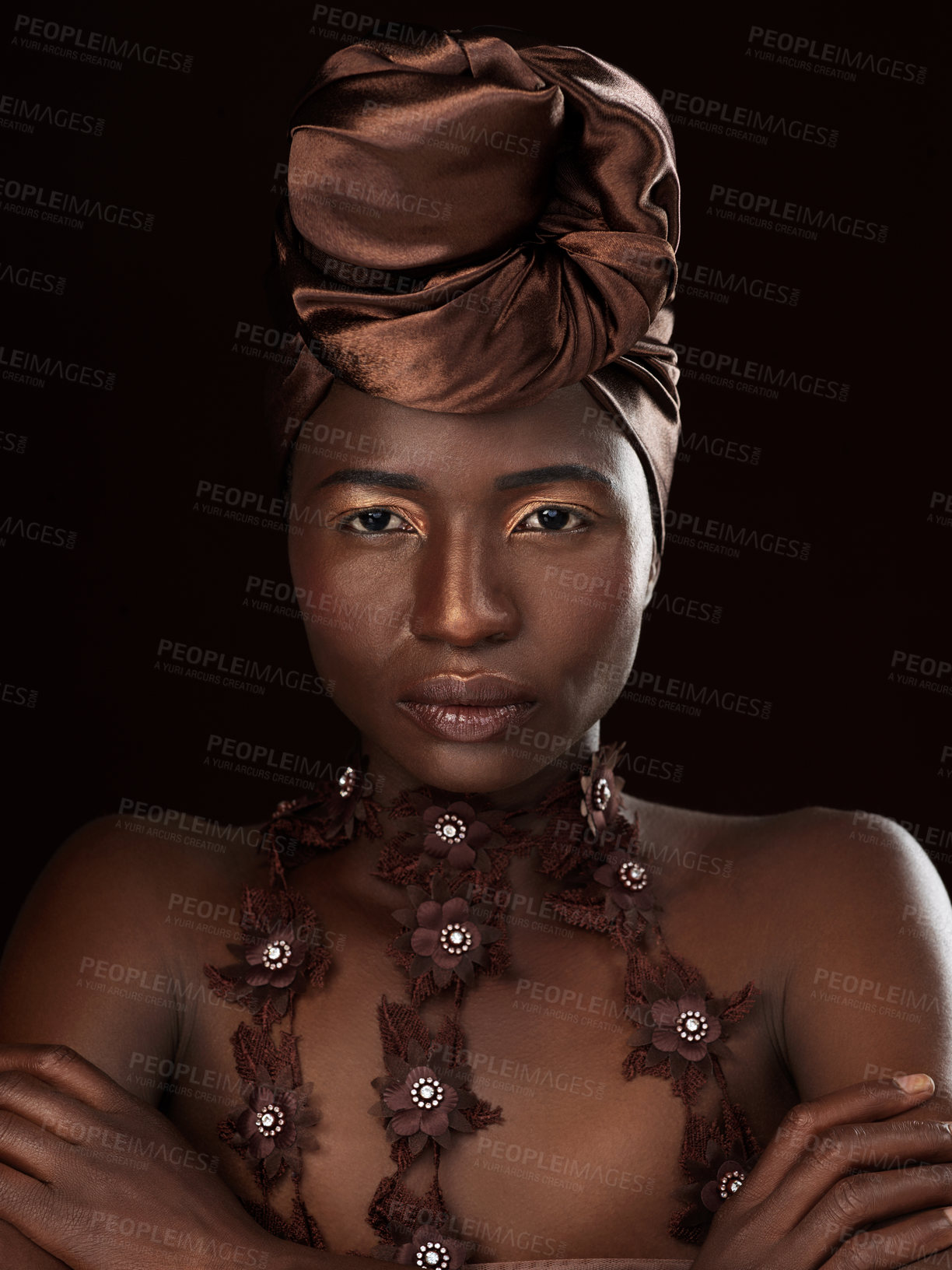 Buy stock photo Turban, portrait or African woman with makeup, arms crossed or pride in studio on black background. Glow, face and serious model with beauty, eyeshadow cosmetics and fashion for culture tradition