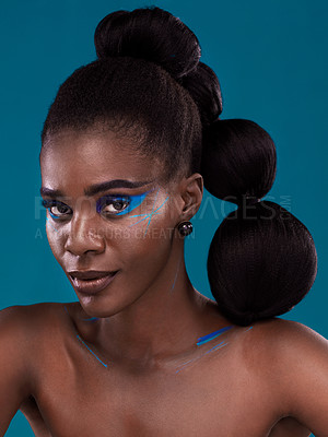 Buy stock photo Portrait, makeup and bold with a model black woman in studio on a blue background for hair or cosmetics. Face, confidence and fashion with an attractive young female person posing to promote beauty