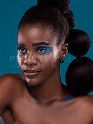 Buy stock photo Thinking, makeup and hair care with an african woman in studio on a blue background for hairstyle or cosmetics. Face, idea and fashion with an attractive young female model posing for beauty or style