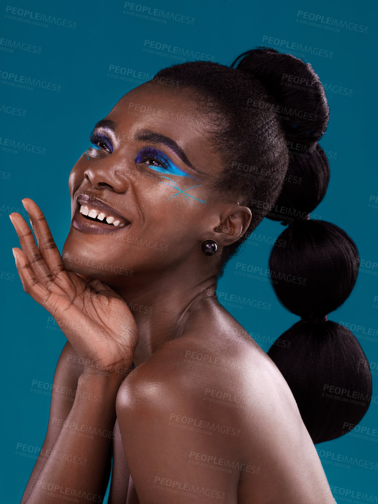 Buy stock photo Thinking, happy and makeup with a model black woman in studio on a blue background for hair or cosmetics. Face, idea and fashion with an attractive young female person posing for cosmetic beauty