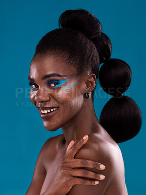 Buy stock photo Portrait, happy and makeup with a model black woman in studio on a blue background for hair or cosmetics. Face, smile and fashion with an attractive young female person posing for cosmetic beauty