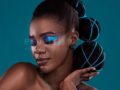 Buy stock photo Face, hand and hair with a model black woman in studio on a blue background for hair or cosmetics. Eyes closed, makeup and fashion with an attractive young female person posing to promote beauty